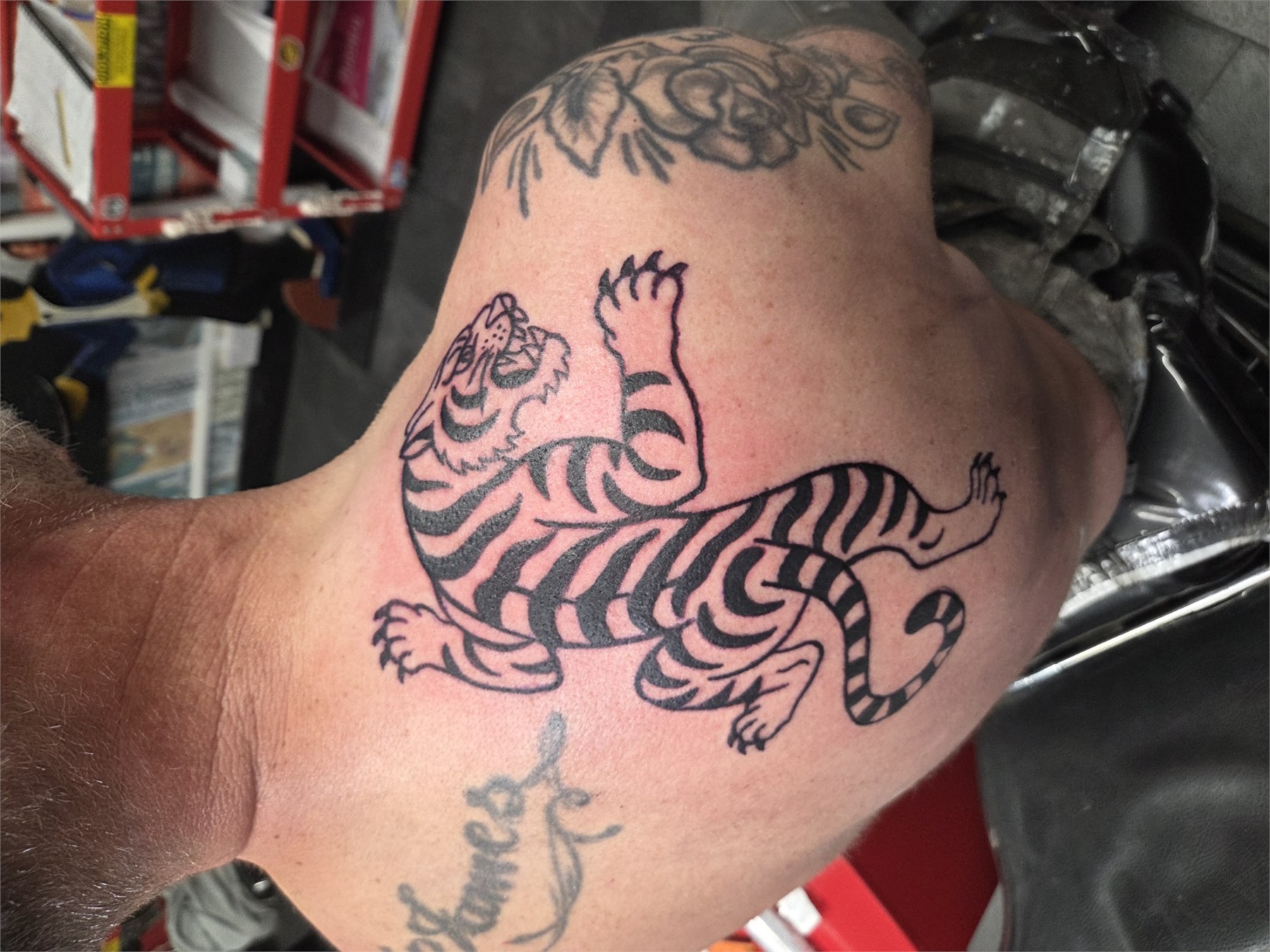 Leaping traditional tiger shoulder tattoo